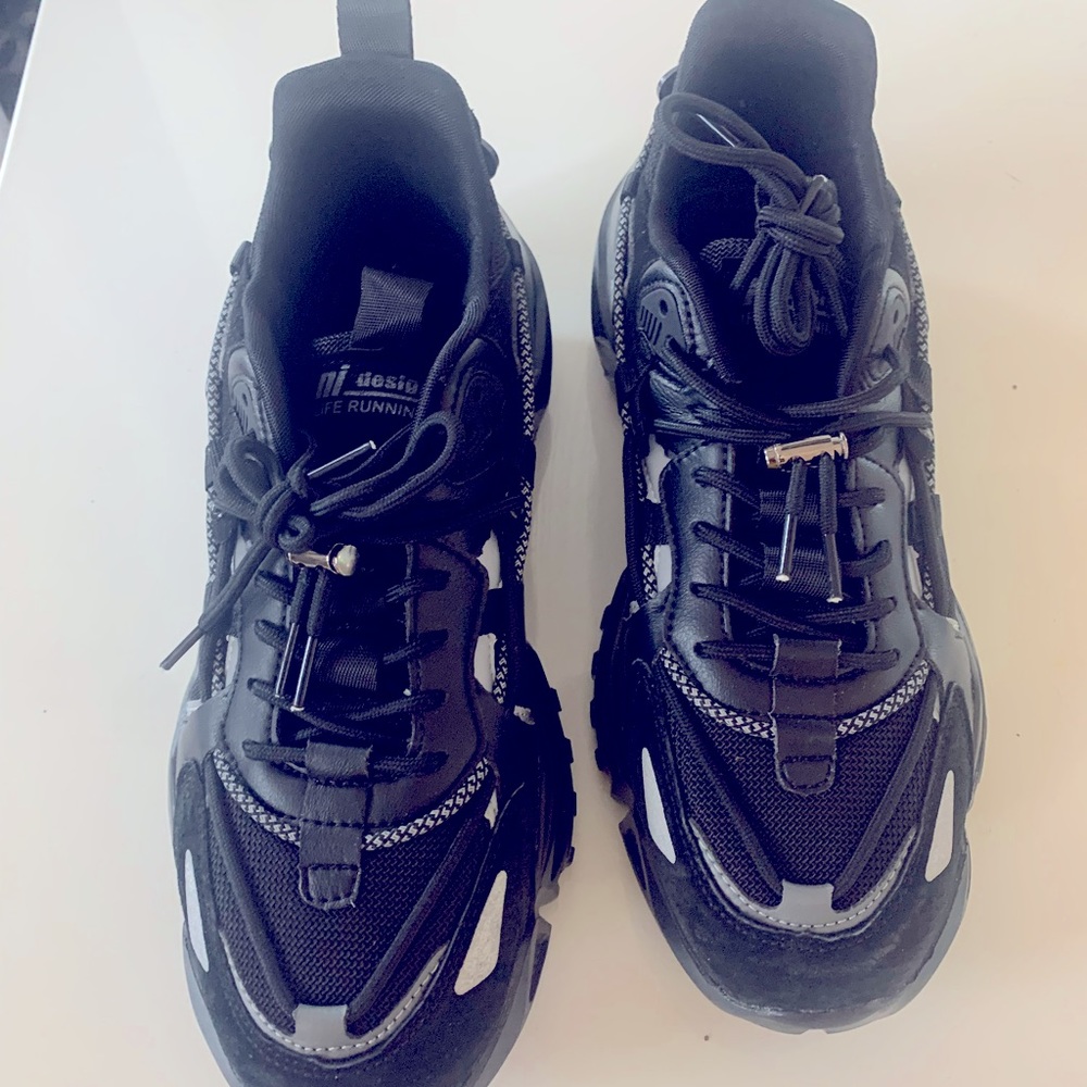 New, never wore. Life running shoes Ni design